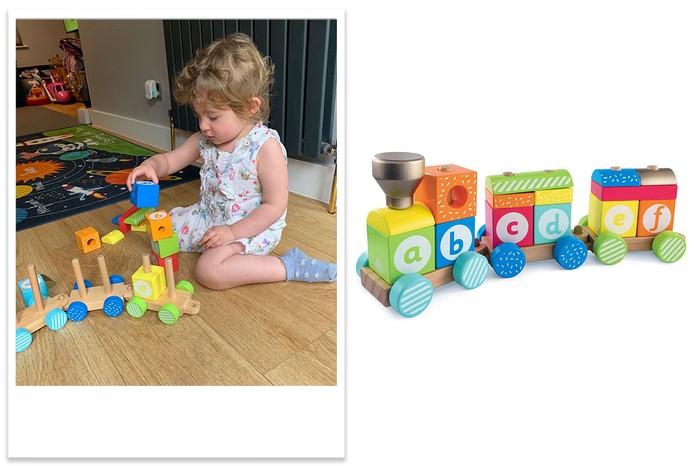 Early Learning Centre Wooden Stacking Train with child tester