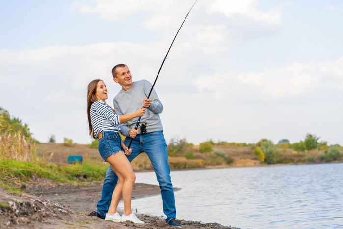 couple with fishing rod
