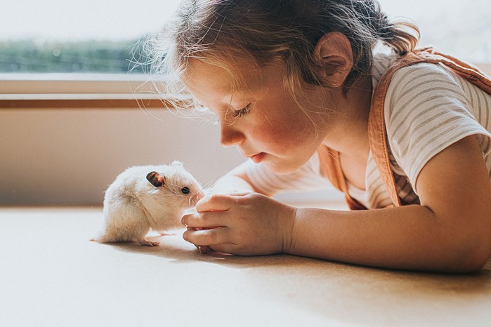 girl with hamster