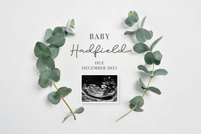 stylishly minimal pregnancy announcement using lettering and foliage and the ultrasound pic